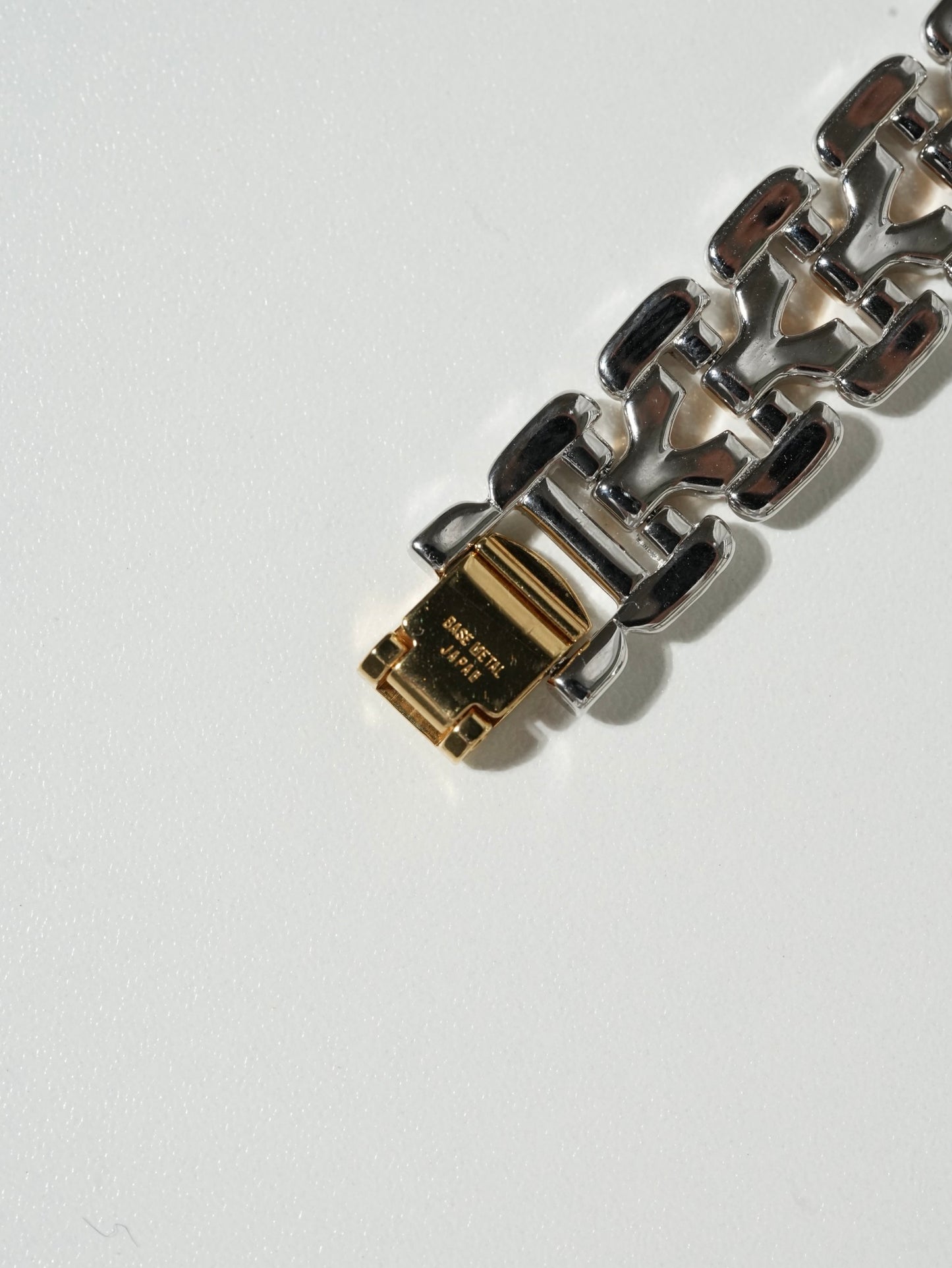 Yves Saint Laurent Two-Tone Round Watch – Silver & Gold Bracelet, Textured White Dial (NEW OLD STOCK)