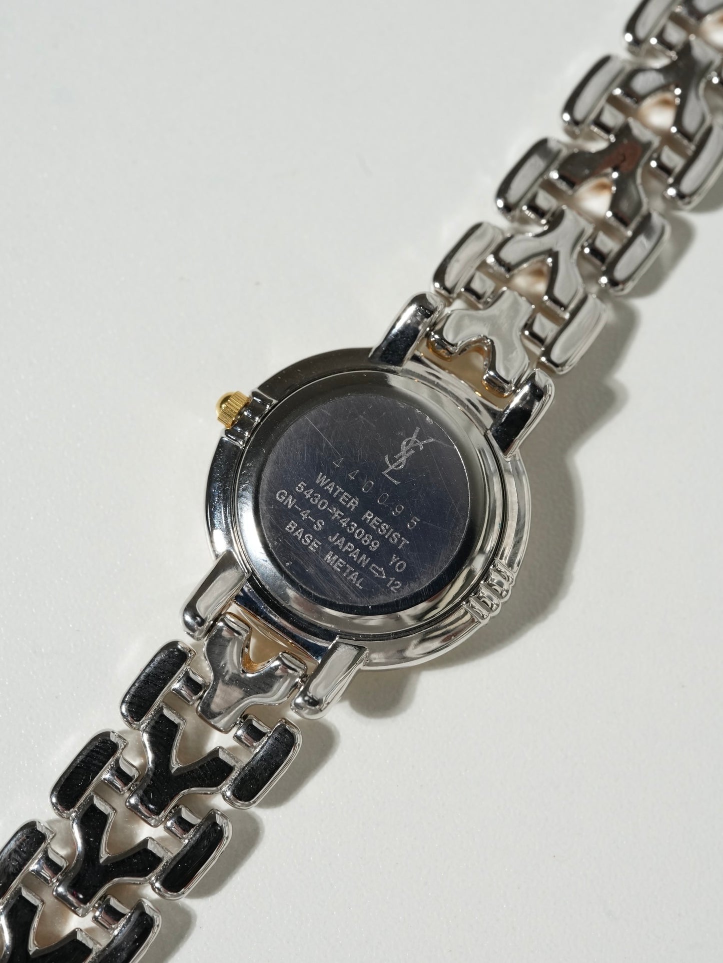 Yves Saint Laurent Two-Tone Round Watch – Silver & Gold Bracelet, Textured White Dial (NEW OLD STOCK)