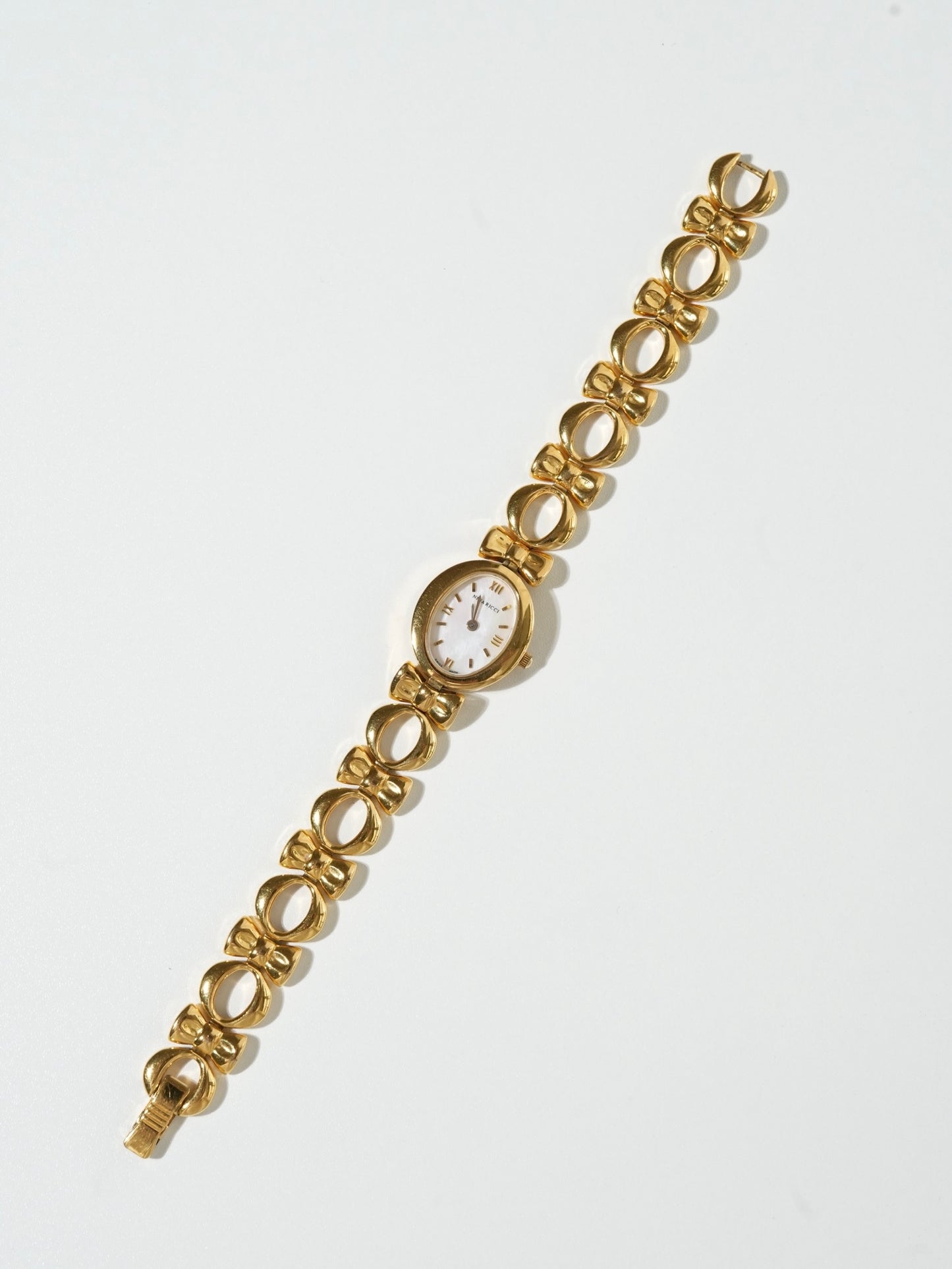 Nina Ricci Ribbon Oval Shell Bracelet Watch