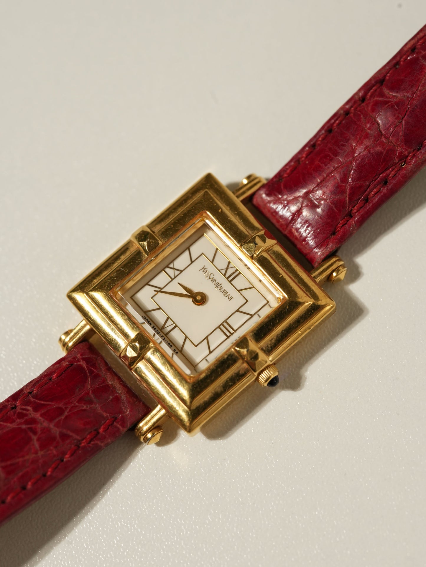 Yves Saint Laurent × Citizen Vintage Pyramid Bezel Watch – Roman Dial / Red Leather