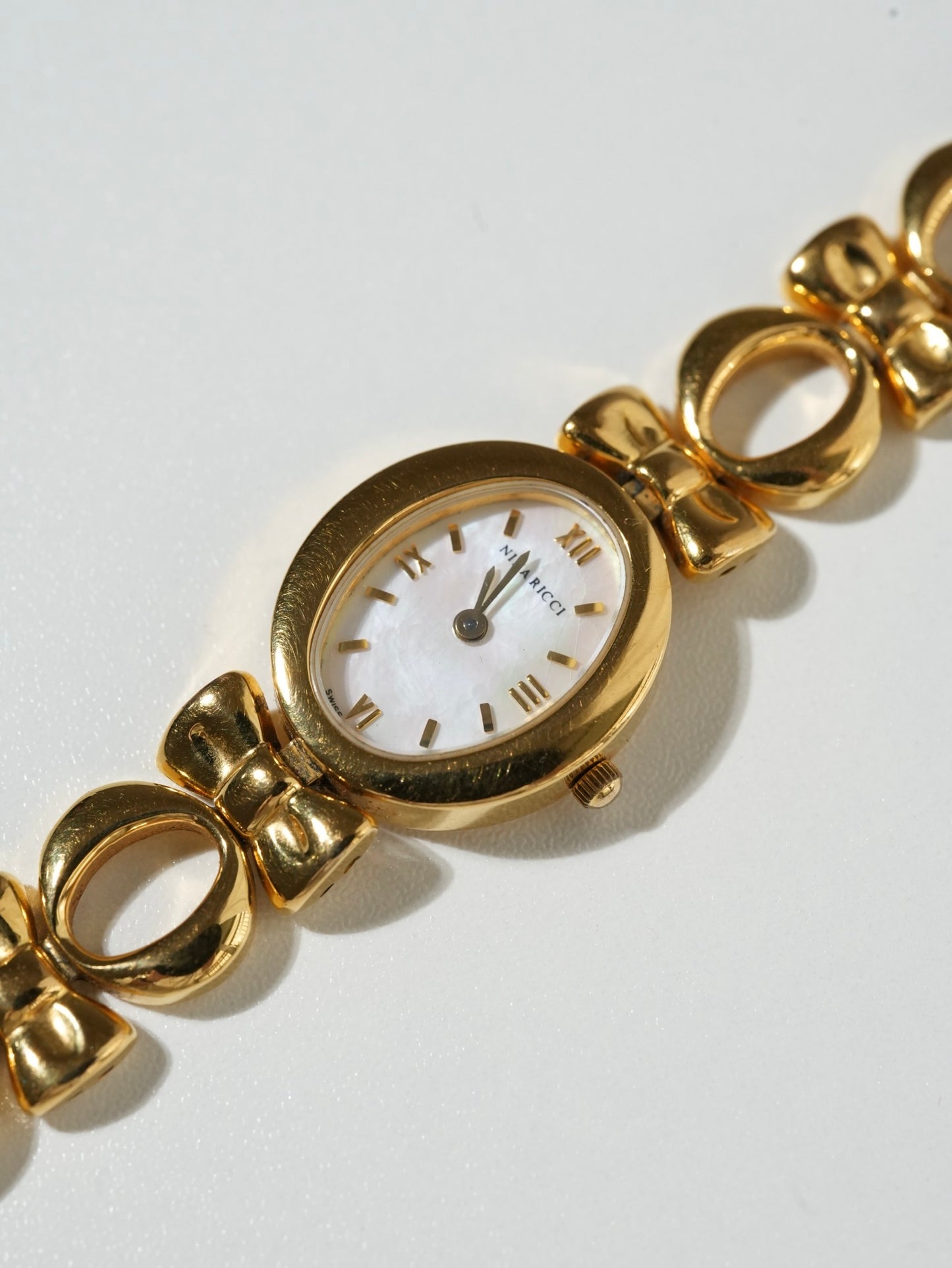 Nina Ricci Ribbon Oval Shell Bracelet Watch