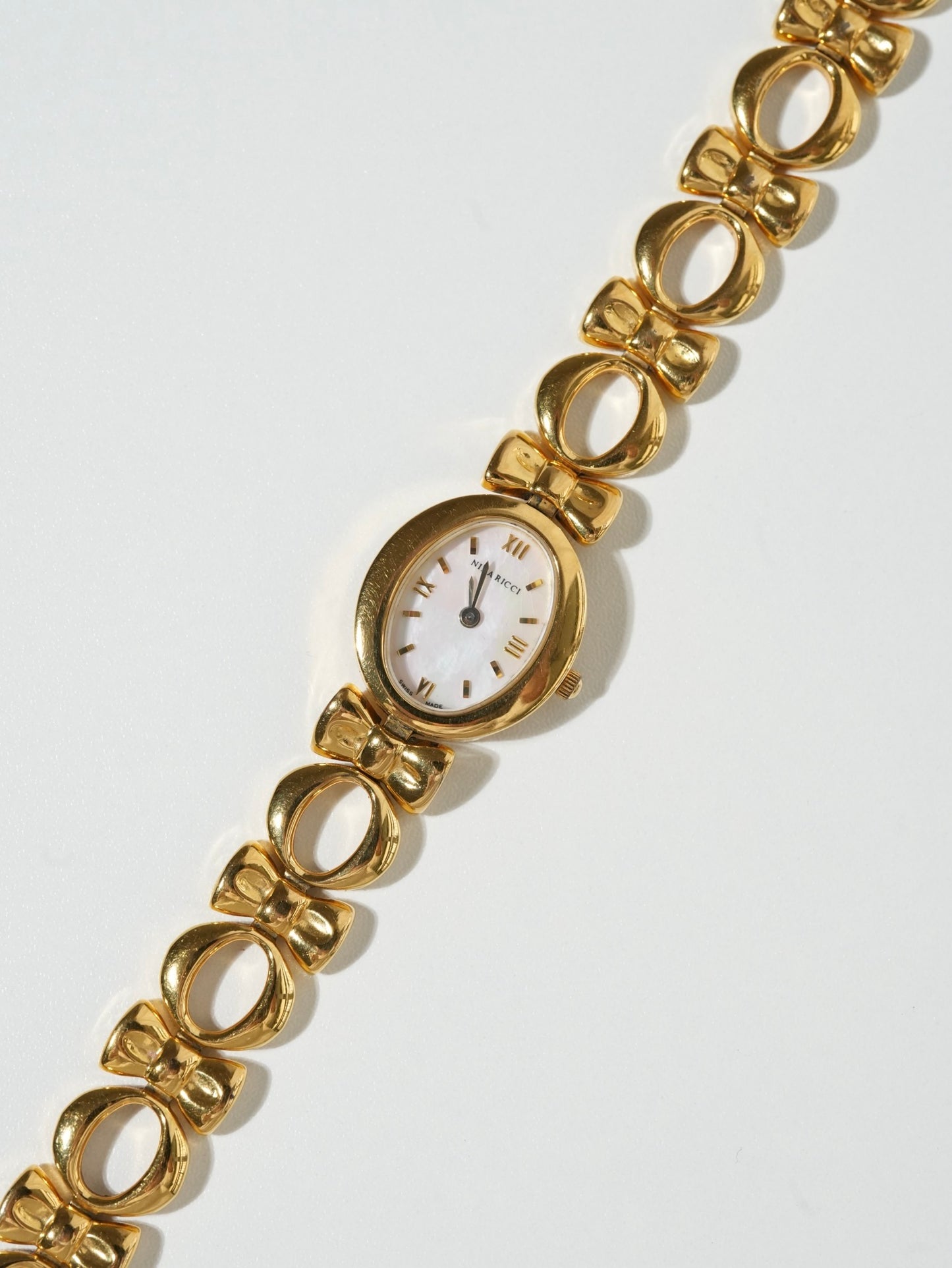 Nina Ricci Ribbon Oval Shell Bracelet Watch
