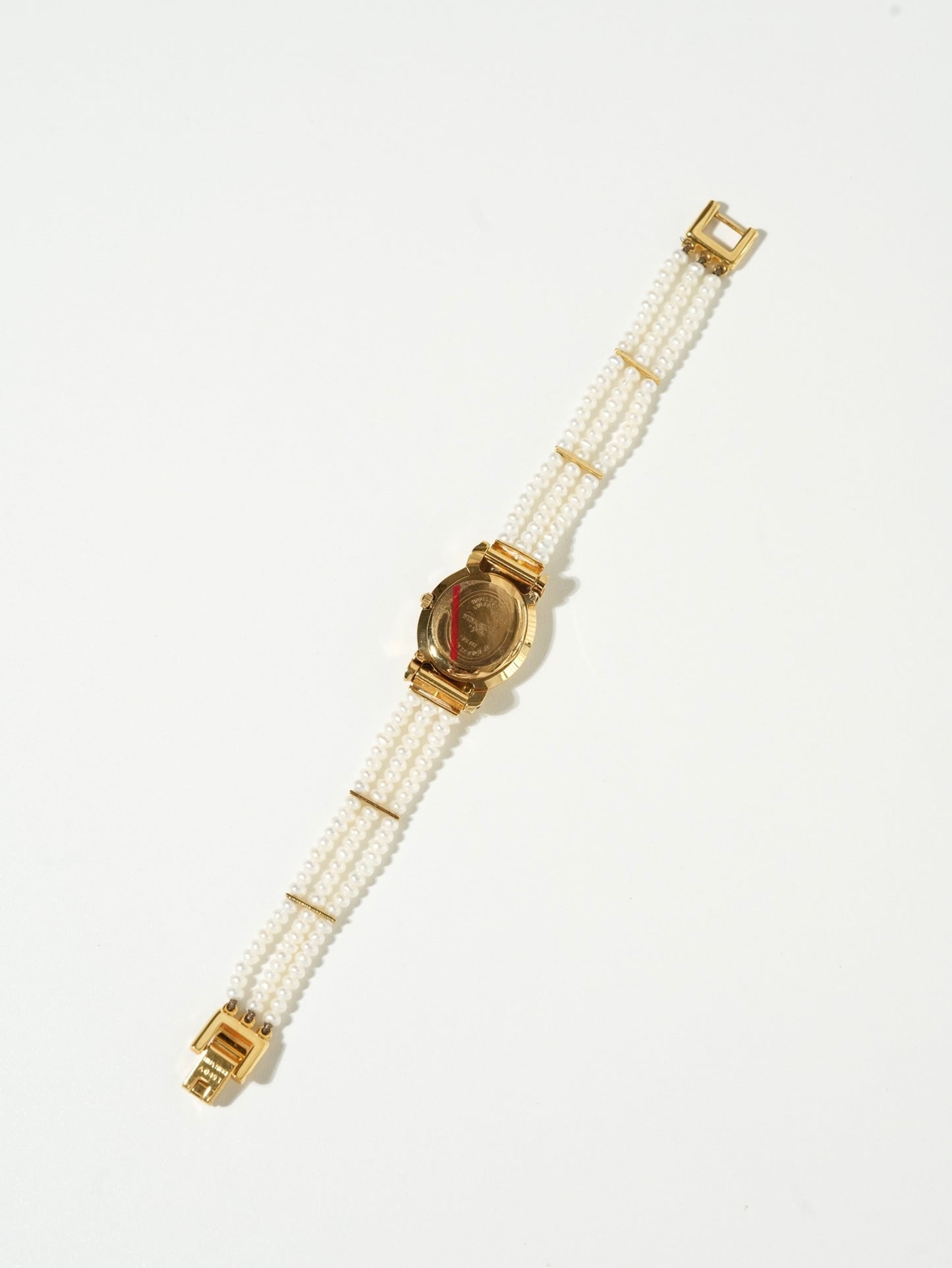 Nina Ricci Pearl Bracelet Watch Set – Gold Case, White Dial with Extra Leather Straps