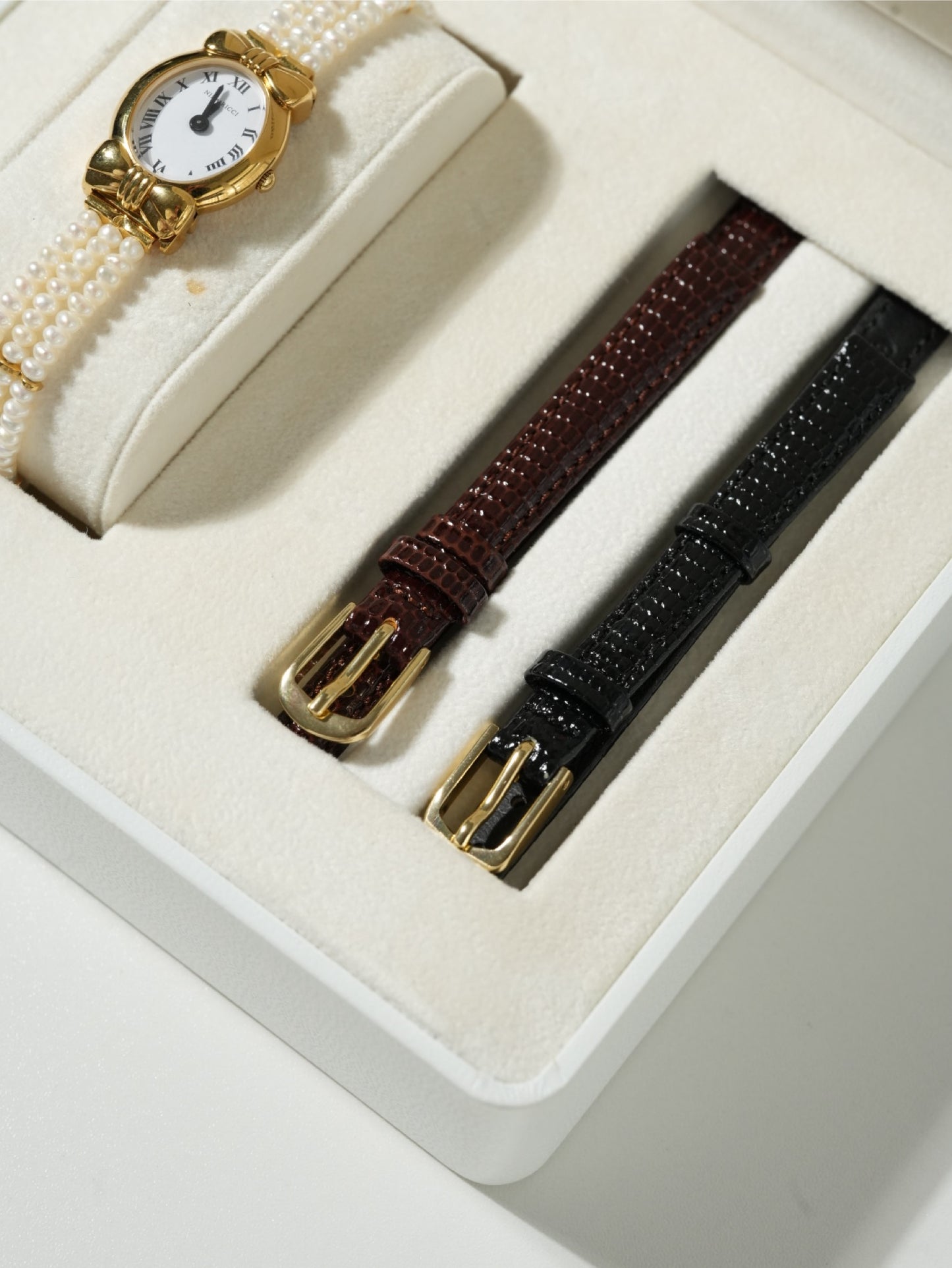 Nina Ricci Pearl Bracelet Watch Set – Gold Case, White Dial with Extra Leather Straps
