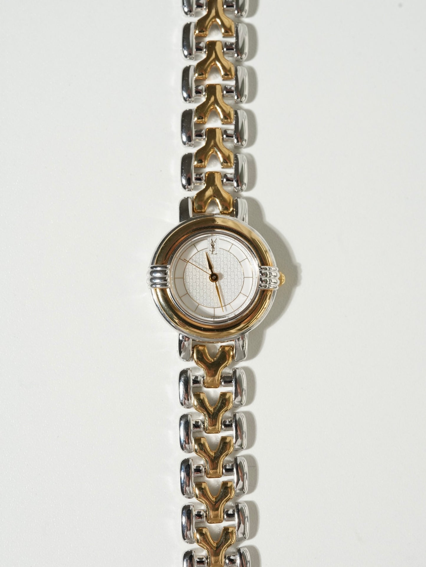 Yves Saint Laurent Two-Tone Round Watch – Silver & Gold Bracelet, Textured White Dial (NEW OLD STOCK)