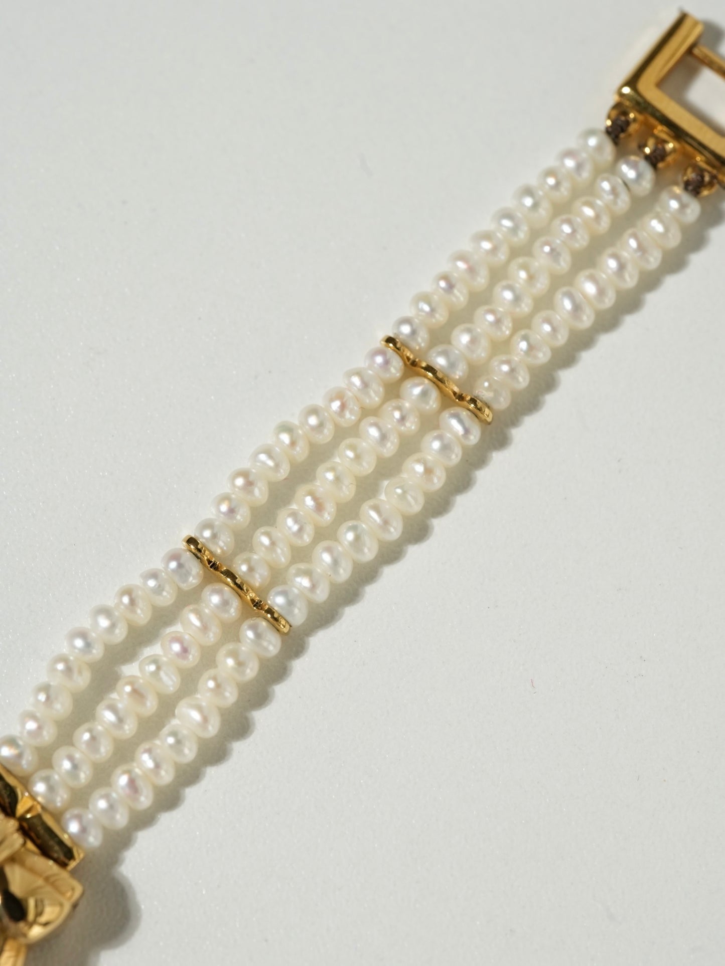 Nina Ricci Pearl Bracelet Watch Set – Gold Case, White Dial with Extra Leather Straps