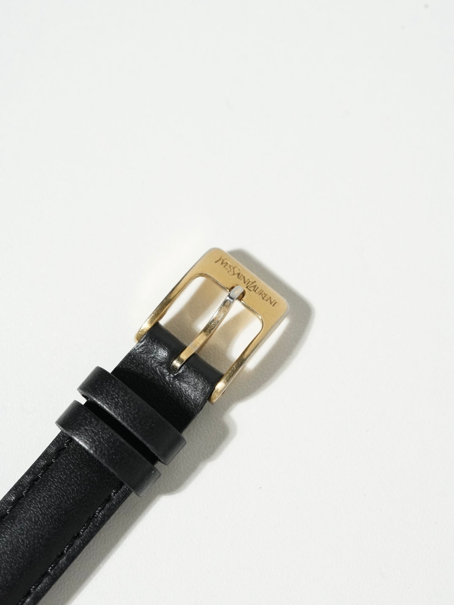 Yves Saint Laurent Tank Rectangle Watch – Gold Tone × Black Leather