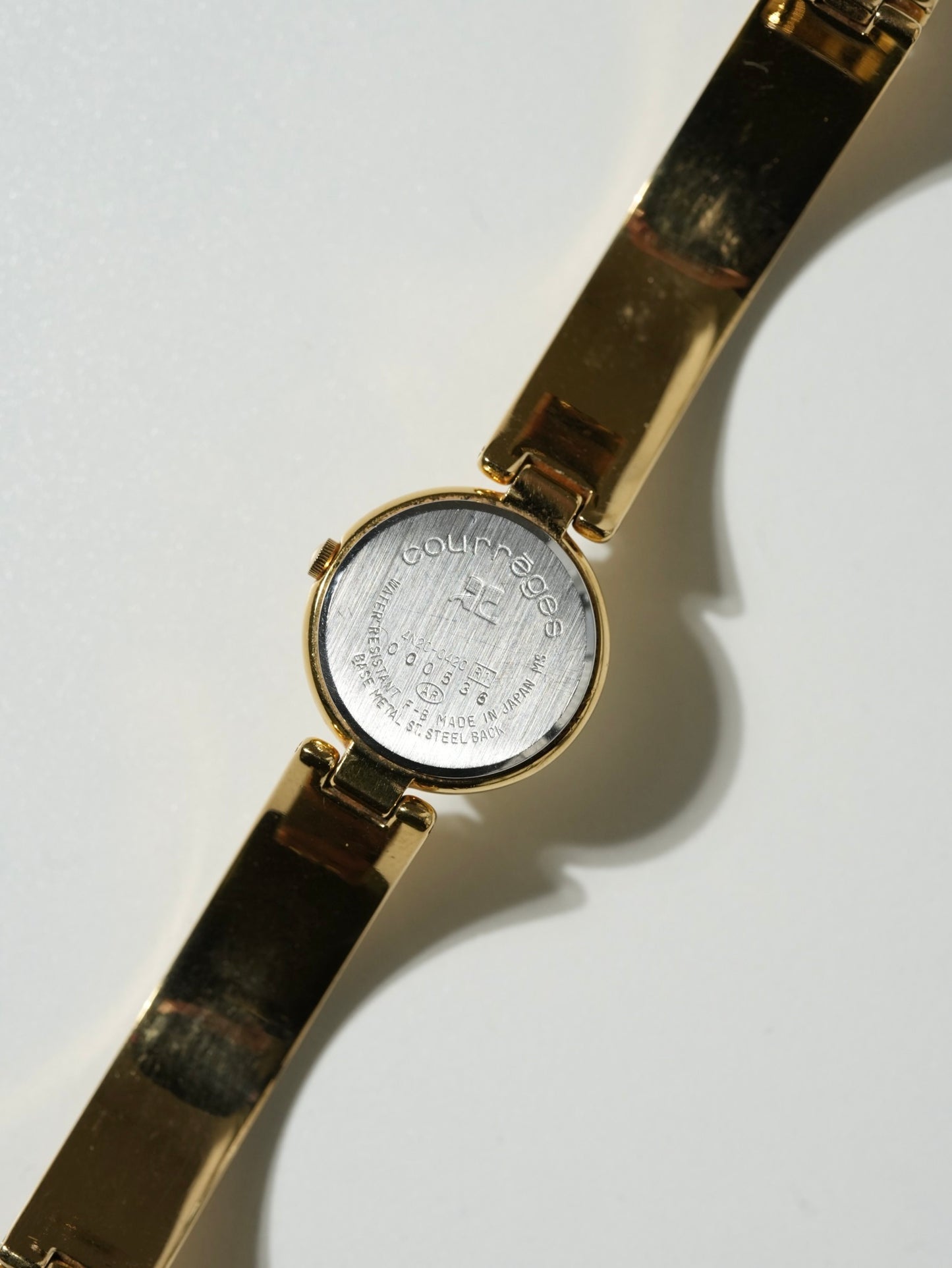 Courrèges Gold Bangle Watch – Minimal Modernist Design