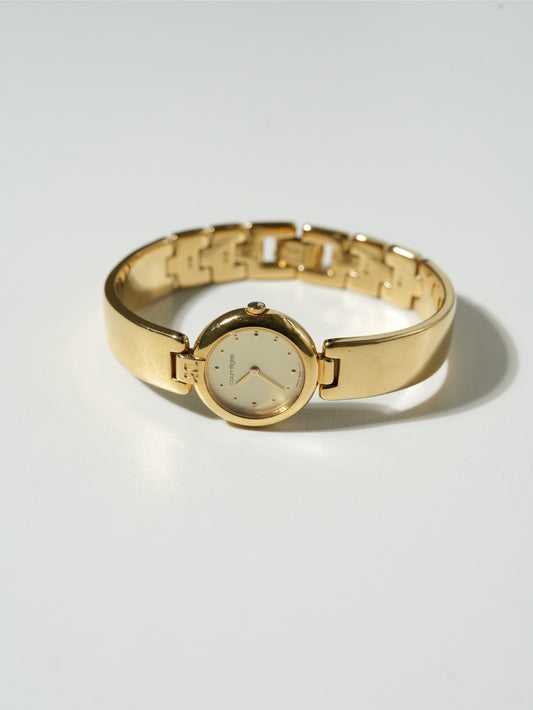 Courrèges Gold Bangle Watch – Minimal Modernist Design